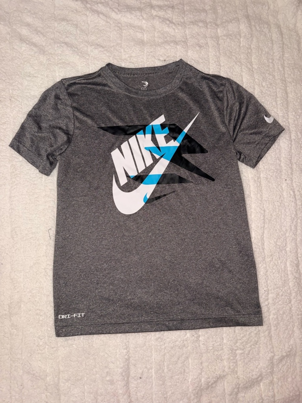 Nike Kid’s Gray Short-Sleeve Dri-FIT Graphic Tee with White & Blue Logo